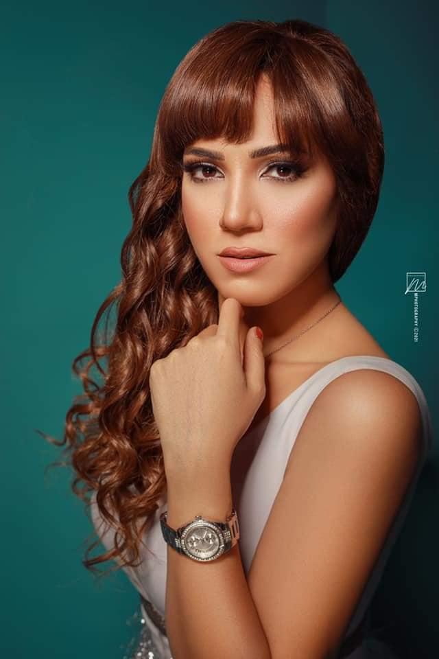 ايمي طلعت زكريا تتألق بالأبيض بعدسة محمد الكشكي