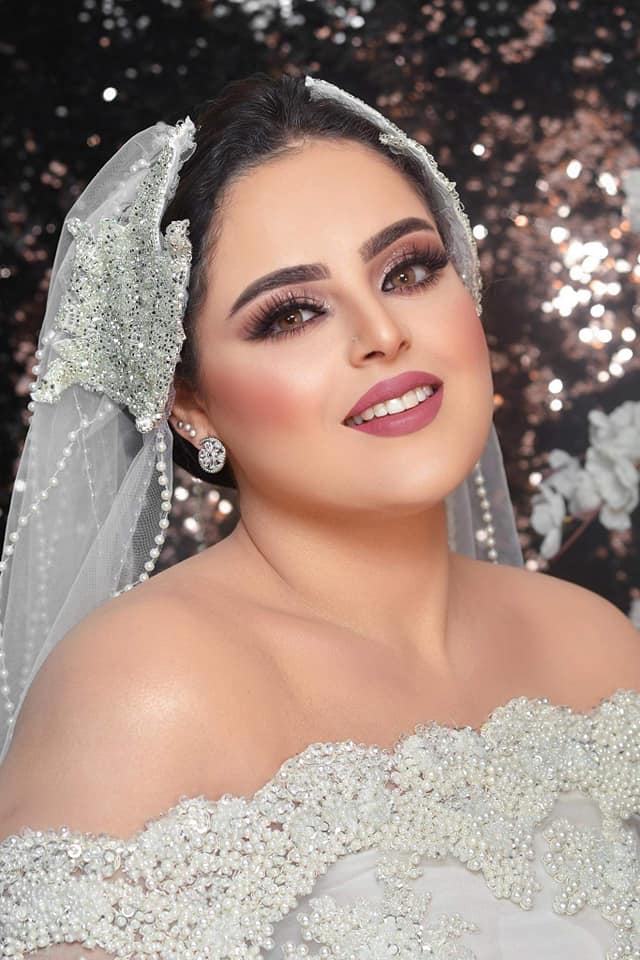 مي فتحي تتوهج بالابيض بلمسة ابتهال التوني