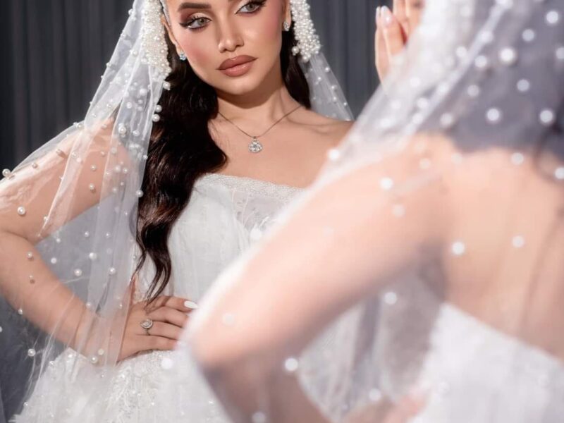 أميرة السنوسي تتألق بالابيض بعدسة خالد صالح